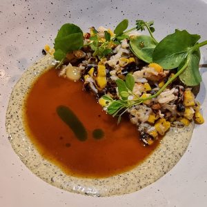 Fraser Isle Spanner Crab, with chicken skin, new corn, and beurre blanc